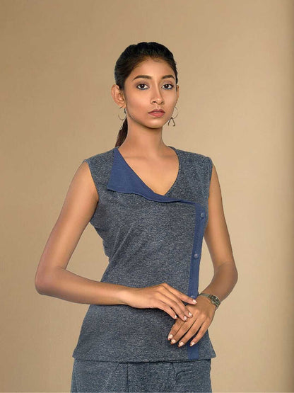 Inara Top – An asymmetric panel top in recycled polyester and hemp, the Inara Top by Jhultaru blends color-block style with fluid form. Eco-friendly, structured, and made with 85% recycled polyester + 15% hemp.