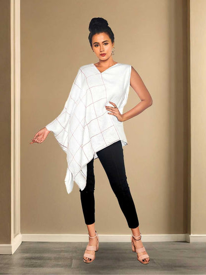 Aivah Top – A white hemp asymmetric top with a handkerchief hem, the Aivah Top by Jhultaru is a poetic take on comfort dressing. Crafted from 100% hemp – sustainable, flowy, breathable, and conscious in construction.