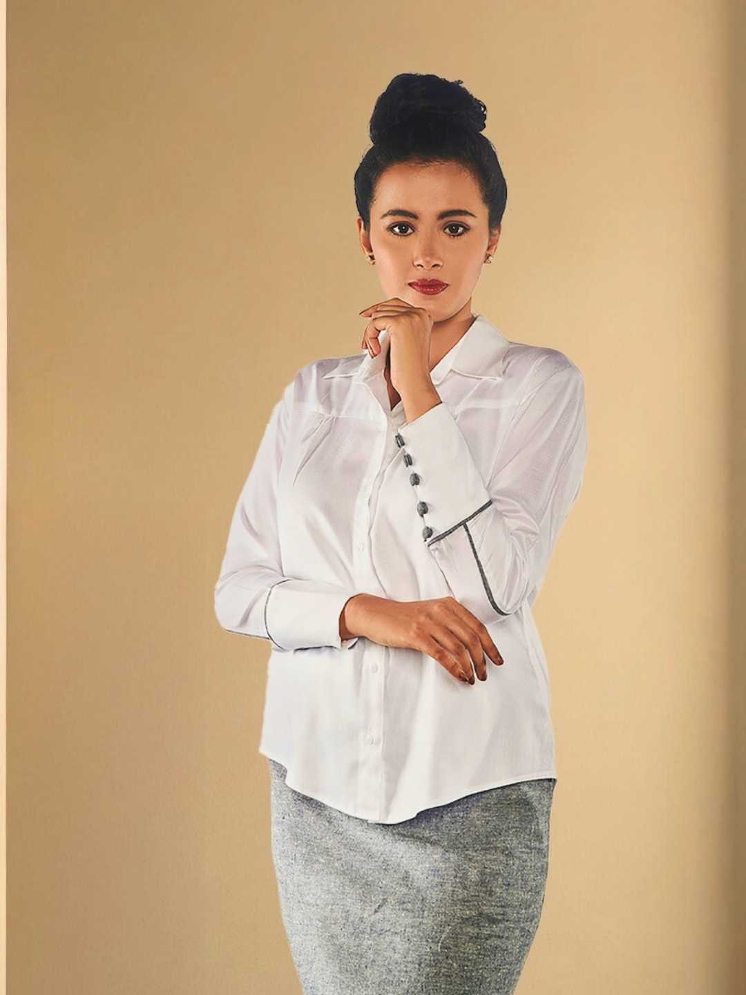 Eira Shirt – A crisp white Tencel shirt with a relaxed fit, the Eira Shirt by Jhultaru merges minimalism with grace. Made from 100% Tencel – eco-friendly, breathable, and luxuriously soft for everyday wear.